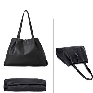 BNWT this black handbag is made of vegan leather with hasp closure